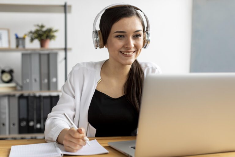 Professional Brandefy virtual assistant wearing a headset and working on a laptop